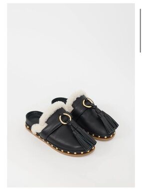 Ulla Johnson Ruby Black Leather Tassel Mules with Cream Shearling Trim